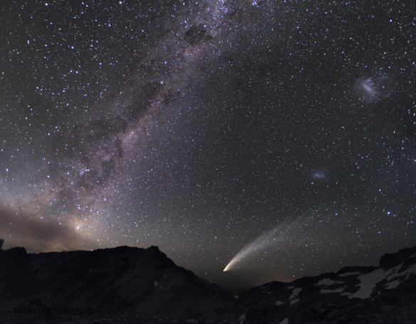 'Three Galaxies and a Comet' -- "Diffuse starlight and dark nebulae along the southern Milky Way arc over the horizon." From Astronomy Picture of the Day http://apod.nasa.gov/apod/ap131020.html 